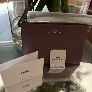 Coach “Jasmine” wristlet New with original tag